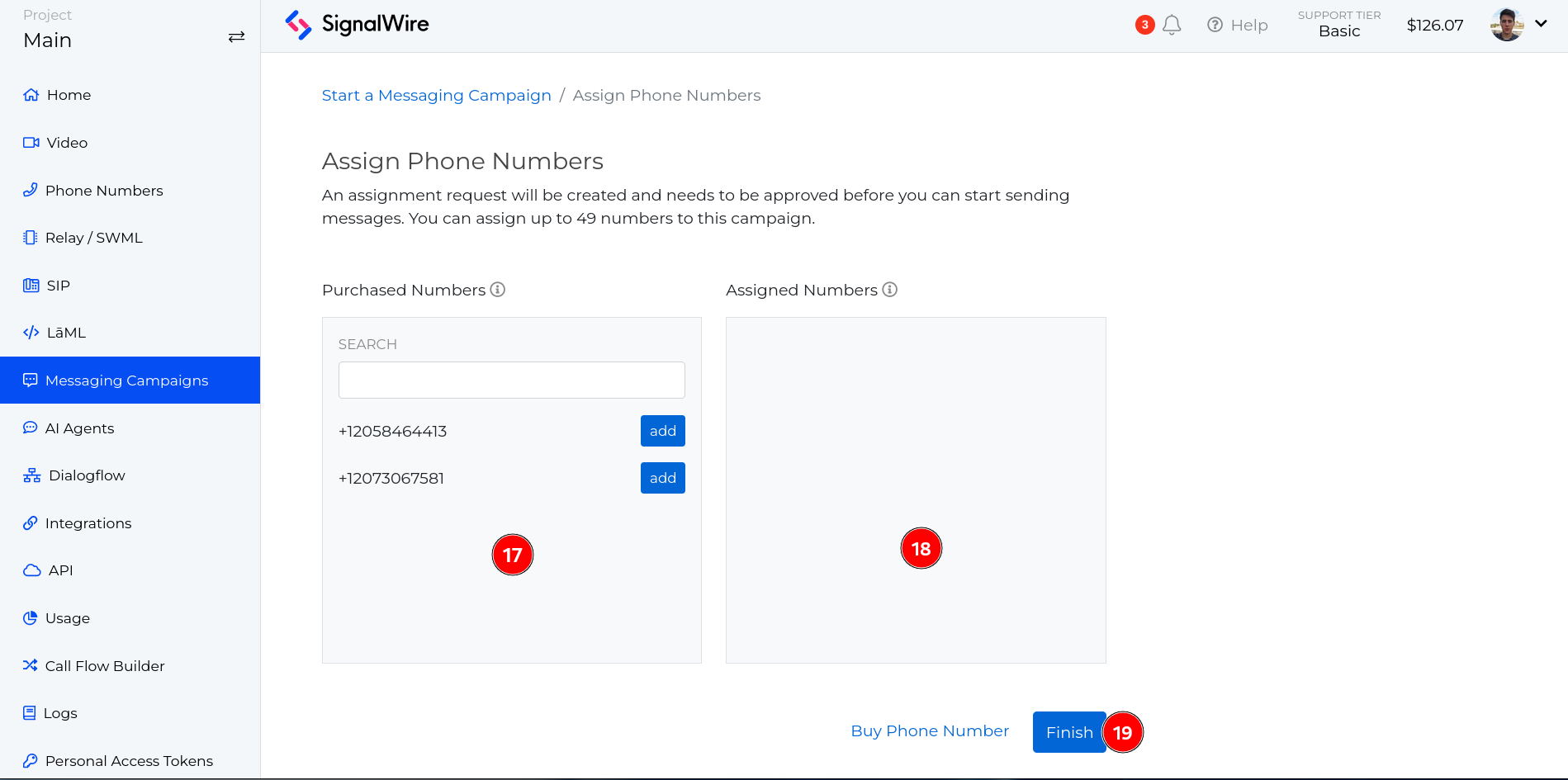 Assign Phone Numbers selection page with purchased numbers on the left, numbers to be assigned on the right, and blue buttons to move numbers and finish the process